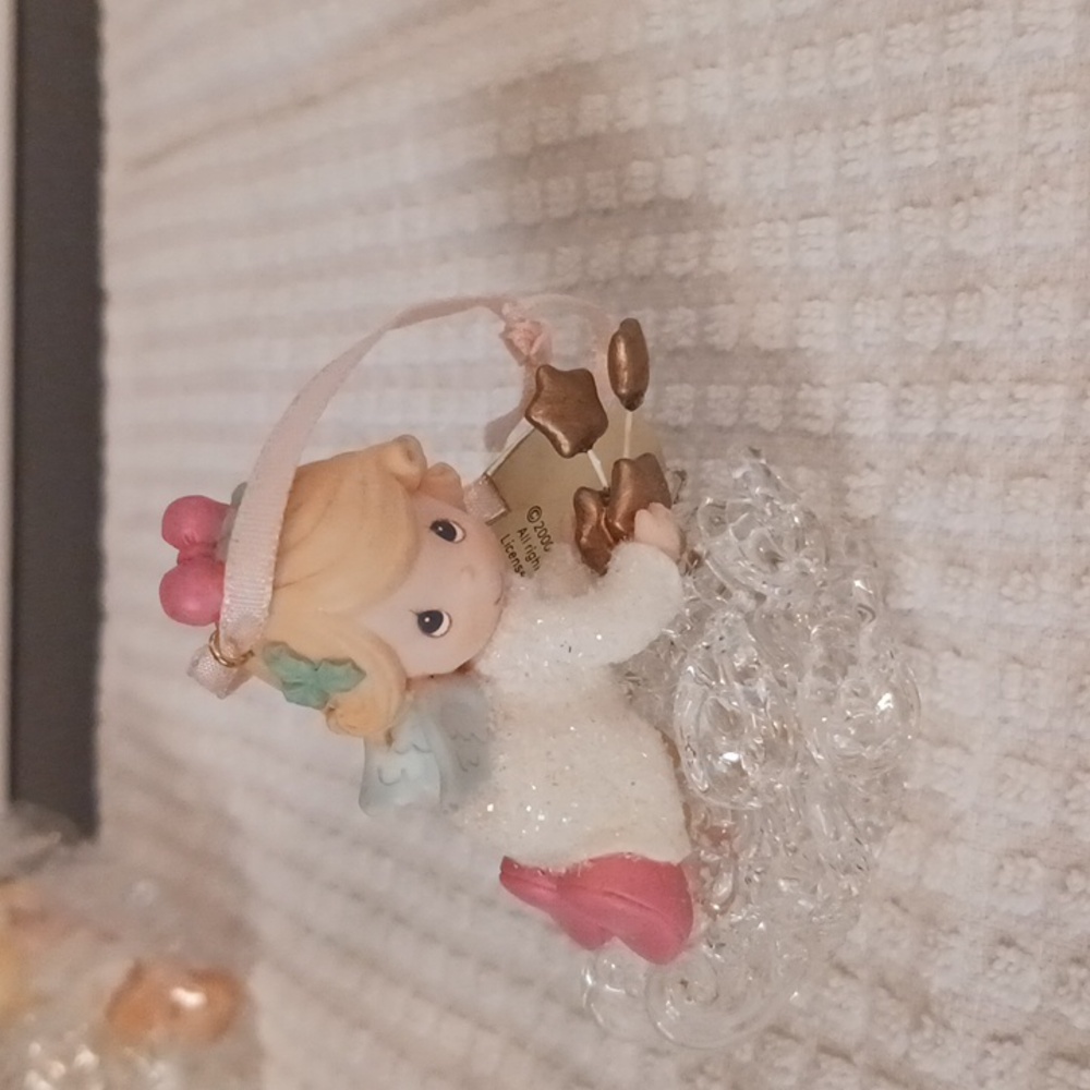Precious Moments Angel Holding  Stars